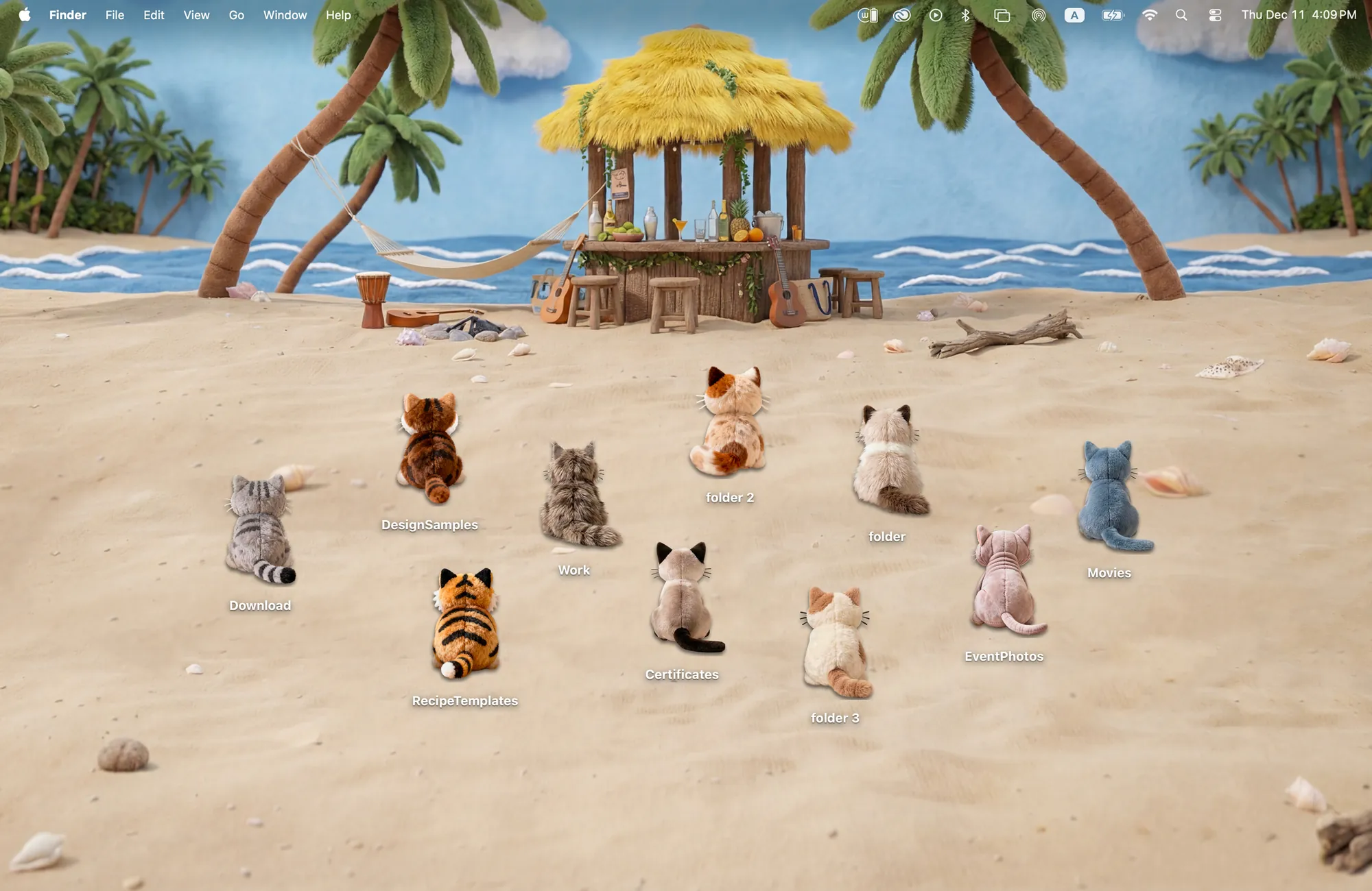 Seaside Kitties cat Mac wallpaper, ten plush kitten folder icons sitting on a sandy beach facing a tiki bar and the sea